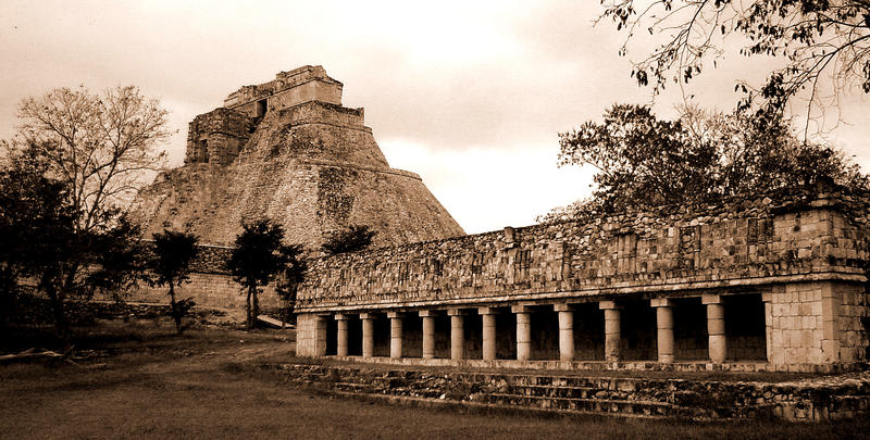sepia toned image of the temples at Uxmal, including the Pyramid of the Magician